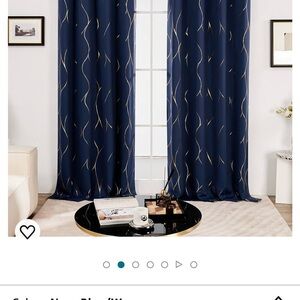 6 navy blue curtains with gold waves.